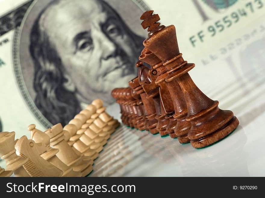 Chess composition on dollar background