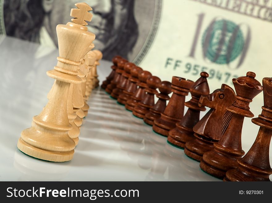 Chess composition on dollar background
