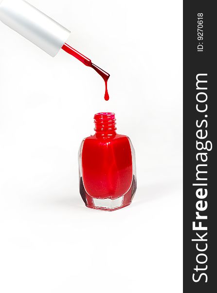 Red drop of nail polish fall down. Red drop of nail polish fall down