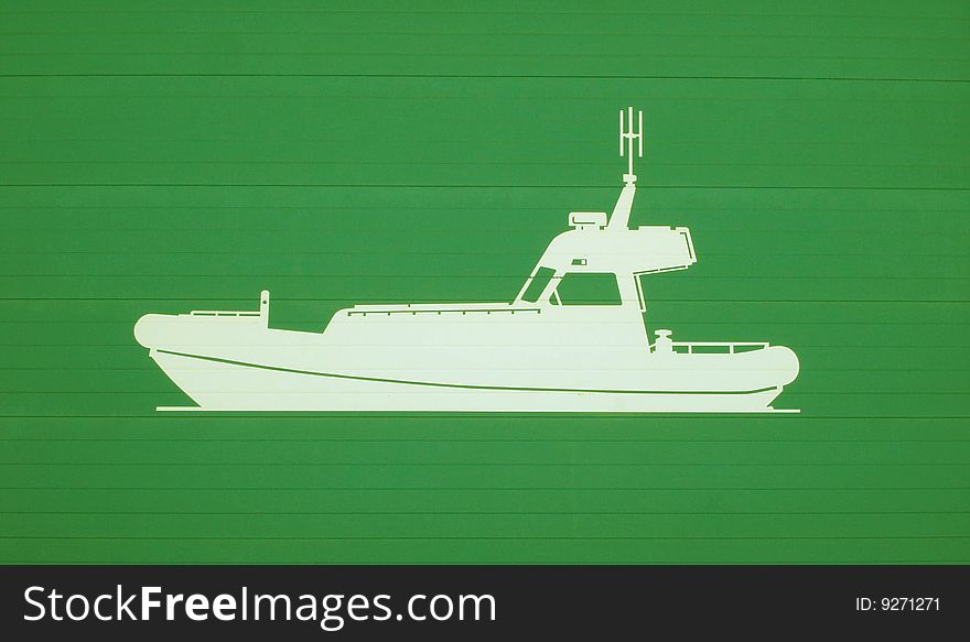 white life boat on a green baclground