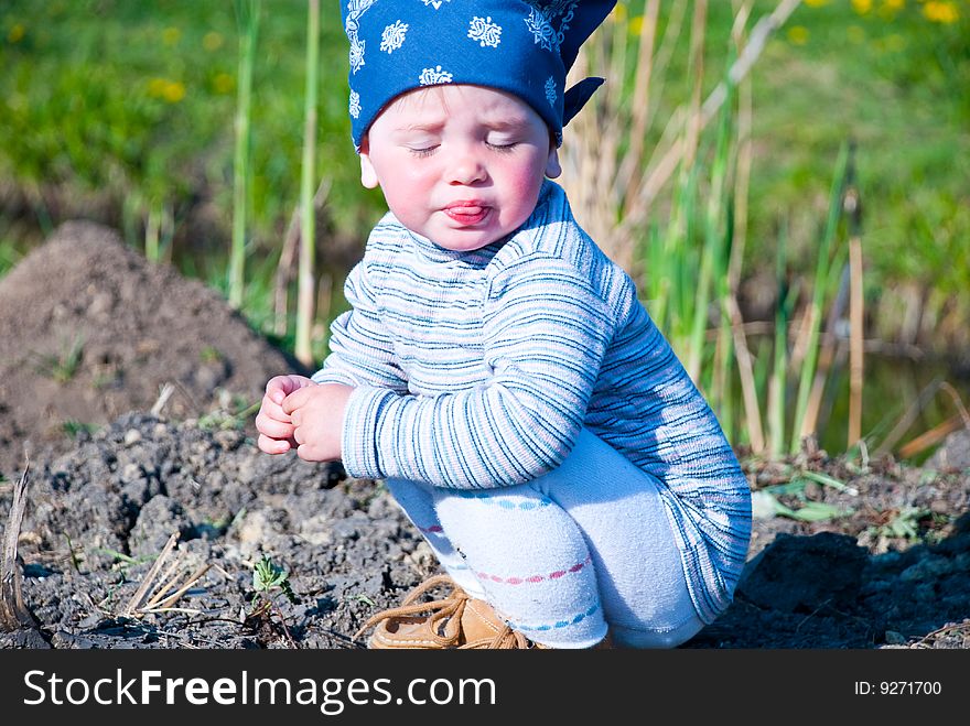 Fun baby girl show a tongue