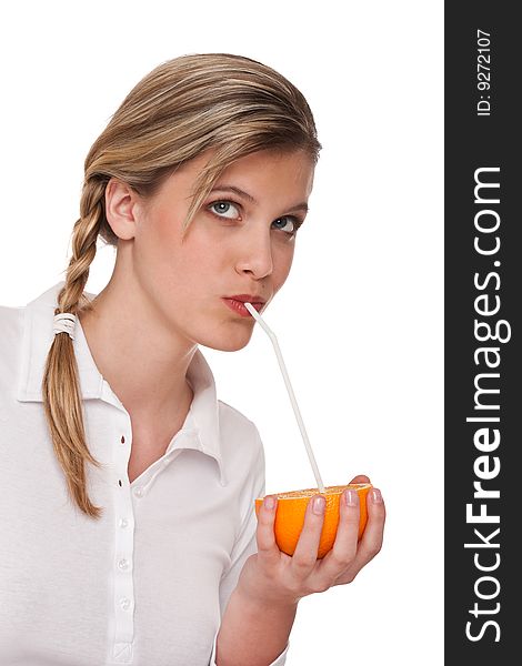 Woman drinking orange on white background. Woman drinking orange on white background