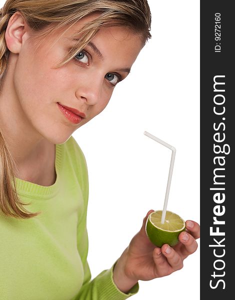 Woman holding lime with straw on white background. Woman holding lime with straw on white background