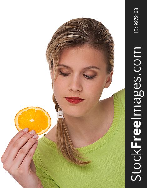 Woman holding slice of orange on white background. Woman holding slice of orange on white background
