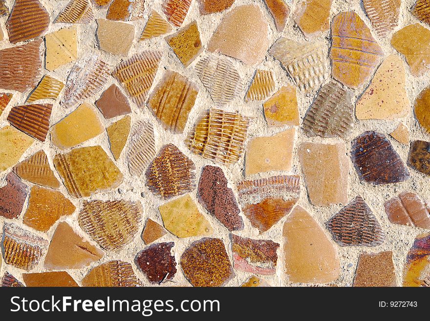 It\'s a beautidul wall  made by pottery chips. It\'s a beautidul wall  made by pottery chips