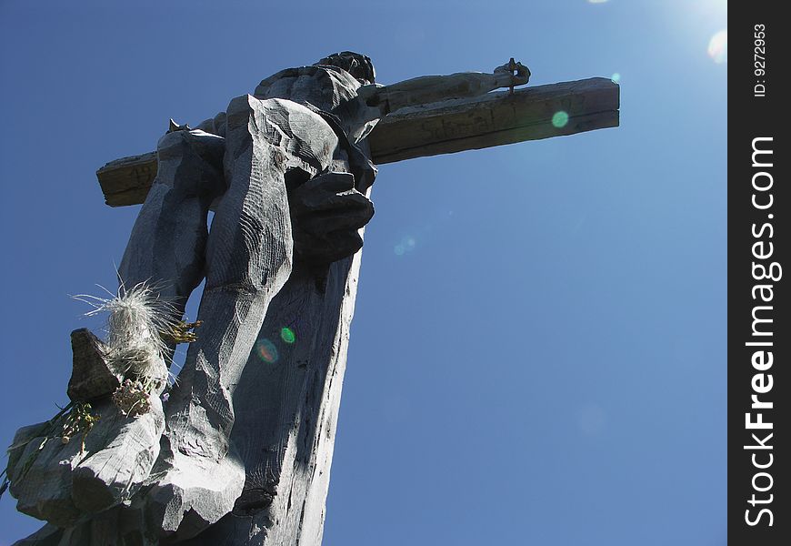 Wooden crucifix face the sun.
Sudtirol - Italy