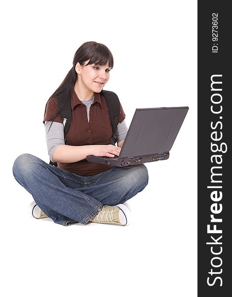 Casual female student with laptop. over white background