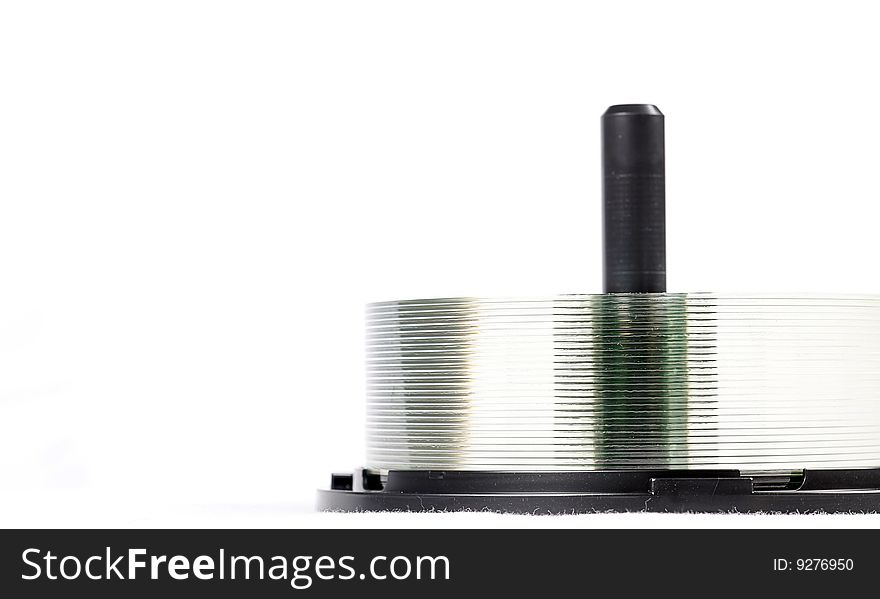 A spool of CD/DVDs, isolated on white. A spool of CD/DVDs, isolated on white.