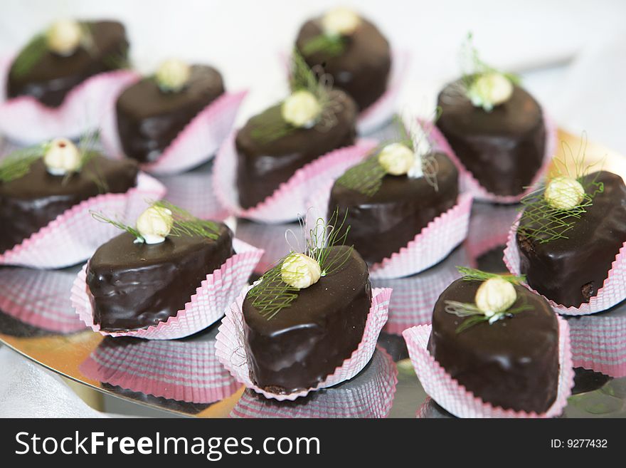 Chocolate cakes. Beautifully decorated by a cream