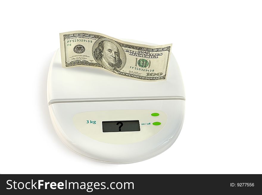 One hundred dollars on the scale isolated over white with clipping path. One hundred dollars on the scale isolated over white with clipping path.