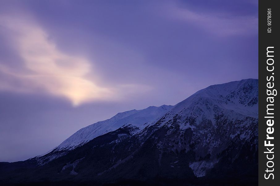 Thinly Veiled Sunlight Over The Frigid Landscape Of The Kenai Peninsula, Alaska