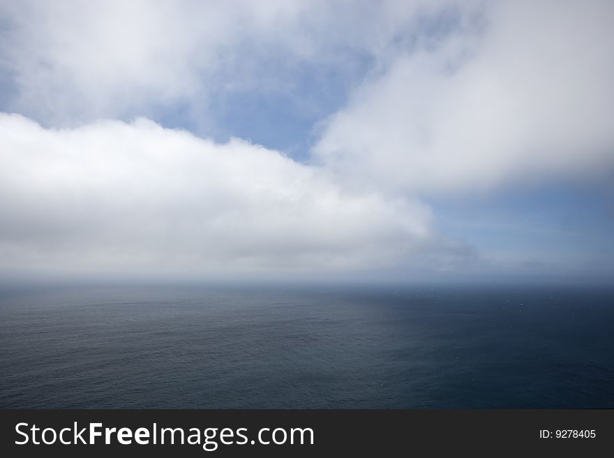 Clouds over ocean seascape