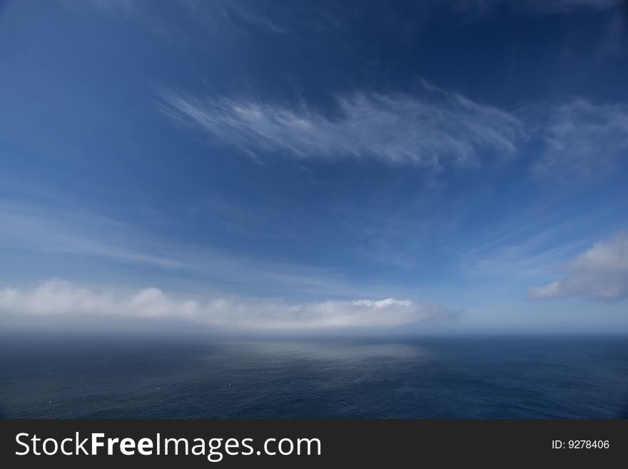 Clouds over ocean seascape