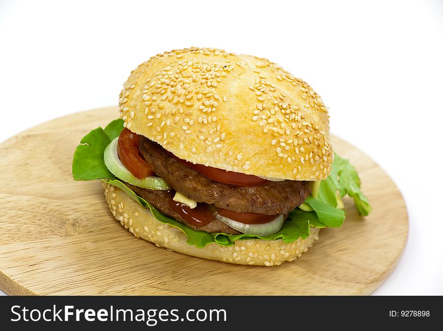 Hamburger with lettuce,cheddar,tomato.