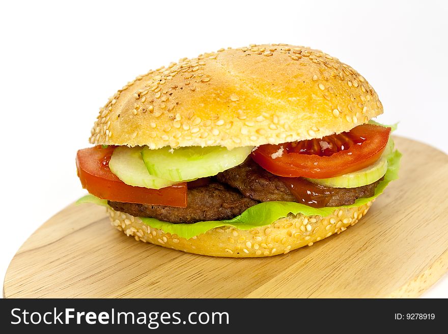 Hamburger with lettuce,cheddar,tomato.