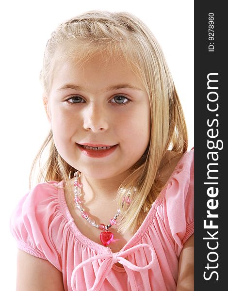 Cute little girl wearing a pink dress