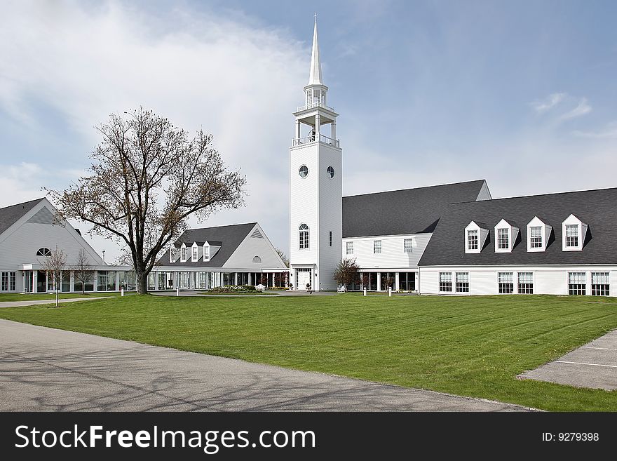 Church with large steeple in suburbs