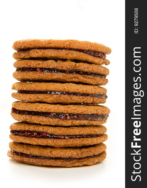 Raspberry ginger snap cookies stacked high. Raspberry ginger snap cookies stacked high