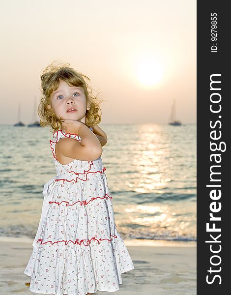 Portrait of little white girl having fun on the beach. Portrait of little white girl having fun on the beach
