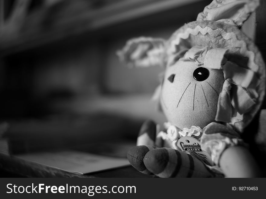 Grayscale Photography Of Cartoon Character Plush Toy