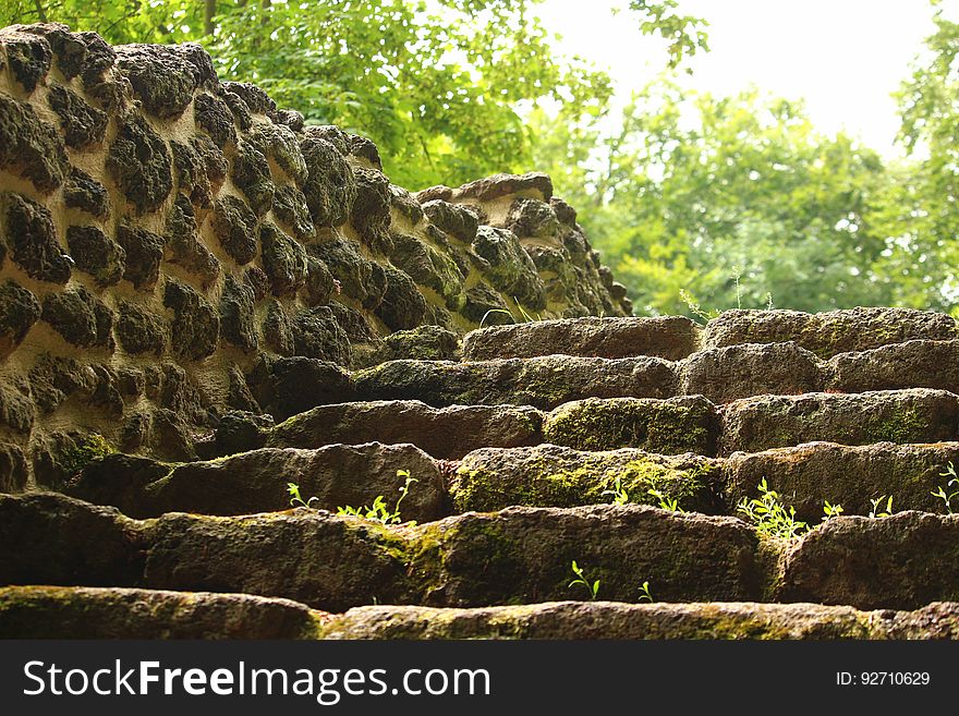 Stone stairway and an old natural stone wall. Stone stairway and an old natural stone wall.