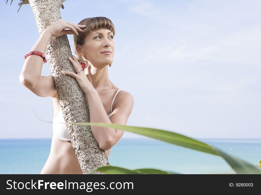 Portrait of beautiful girl having good time on tropical beach. Portrait of beautiful girl having good time on tropical beach