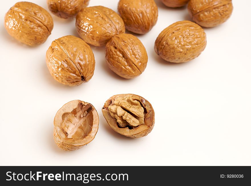 Walnuts isolated on white, one cracked