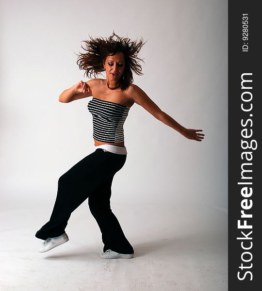 Young attractive teenage dancing high resolution image