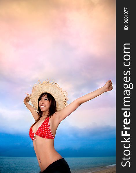 Happy young woman having fun by the beach. Happy young woman having fun by the beach