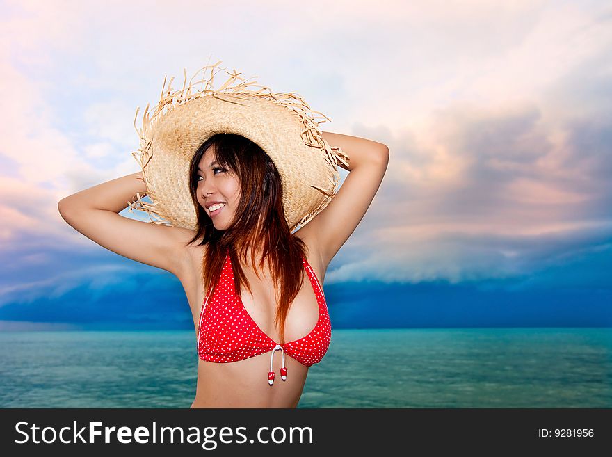 Happy young woman having fun by the beach. Happy young woman having fun by the beach