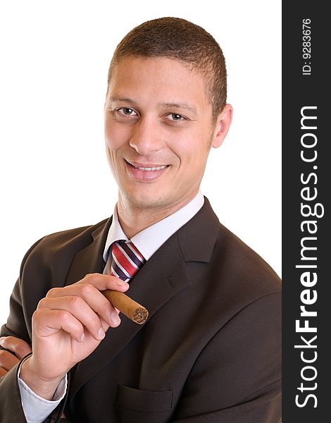 Businessman holds a cuban cigar in his hand. Businessman holds a cuban cigar in his hand