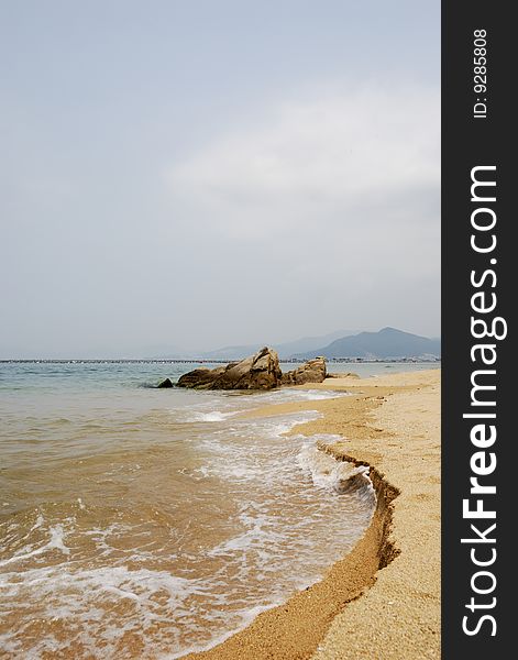 Summer beach and Rock stone