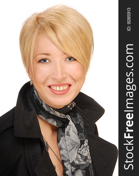 Close up portrait of a luxurious blond woman with beautiful blue eyes,dressed in a black coat, isolated on on white background. Close up portrait of a luxurious blond woman with beautiful blue eyes,dressed in a black coat, isolated on on white background