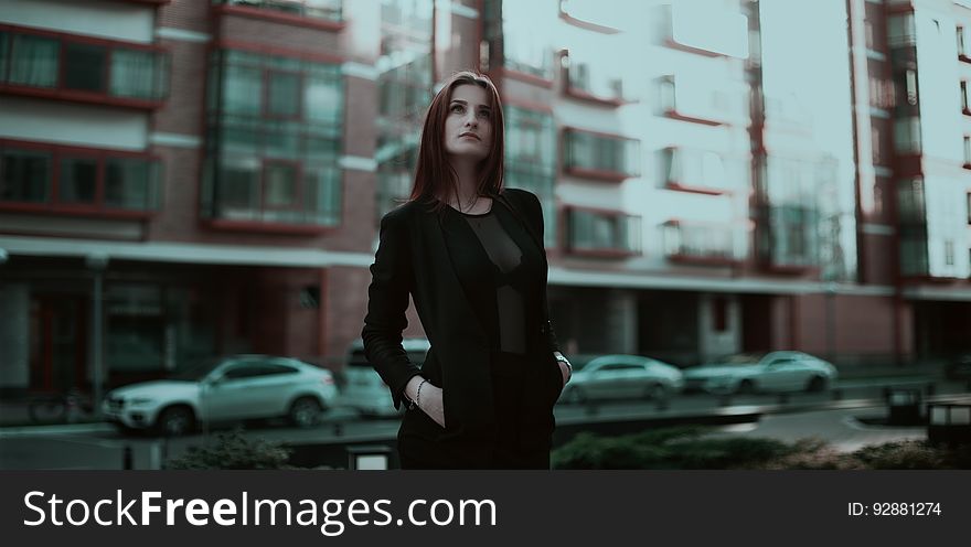 Woman Standing Looking Up