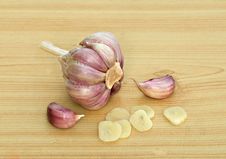 Garlic And Cloves On Desk Stock Photo Garlic And Cloves On Desk Stock Photo