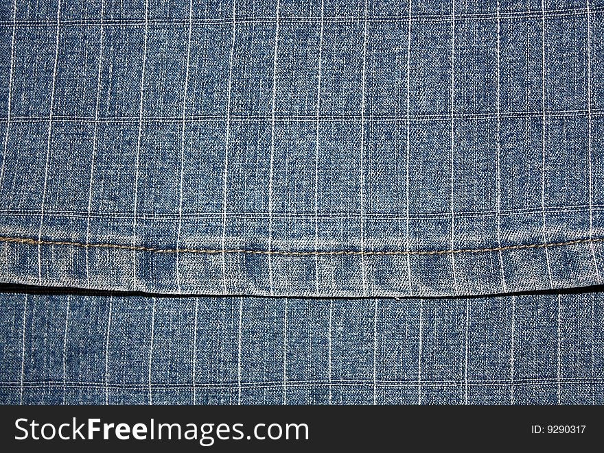 Texture a dark blue jeans fabric in a strip