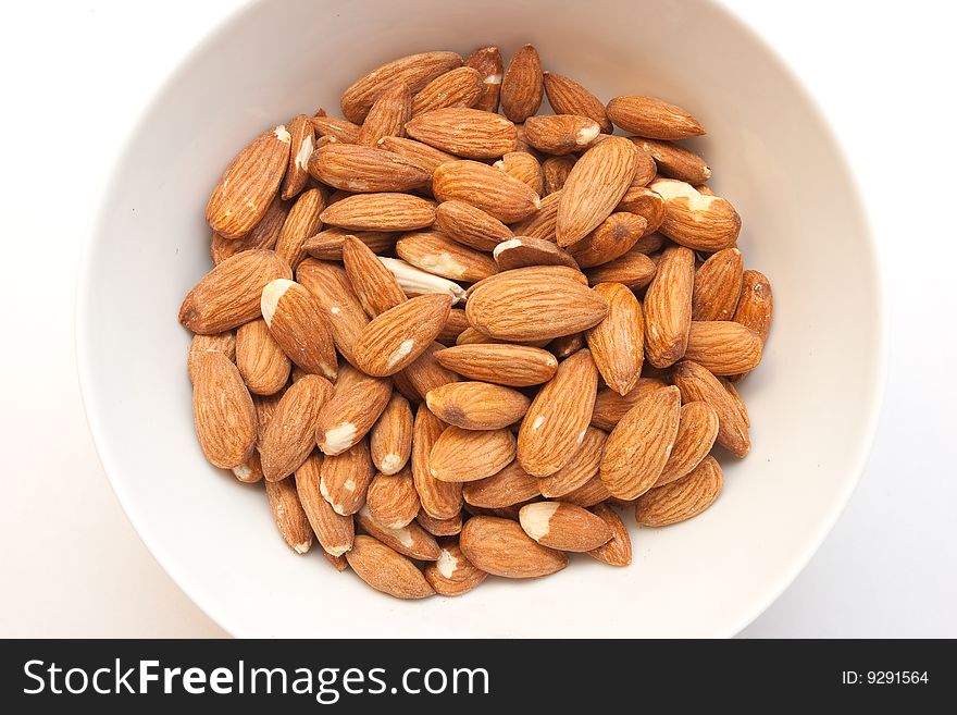 Almonds nut in white plate. Almonds nut in white plate