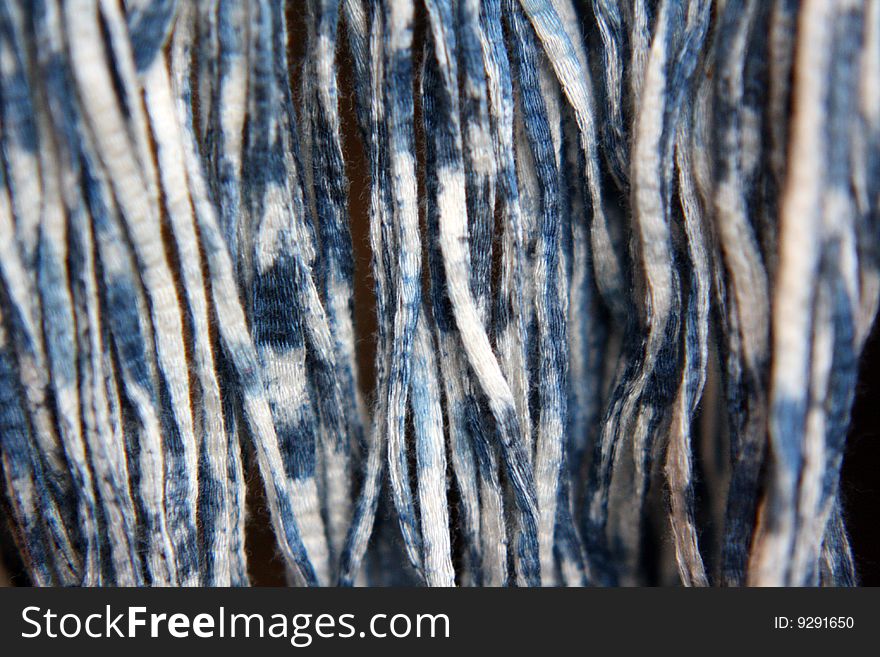 Closeup of blue and white striped yarn. Closeup of blue and white striped yarn