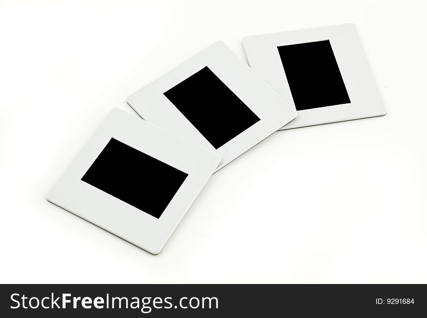 Three slides with plastic frames