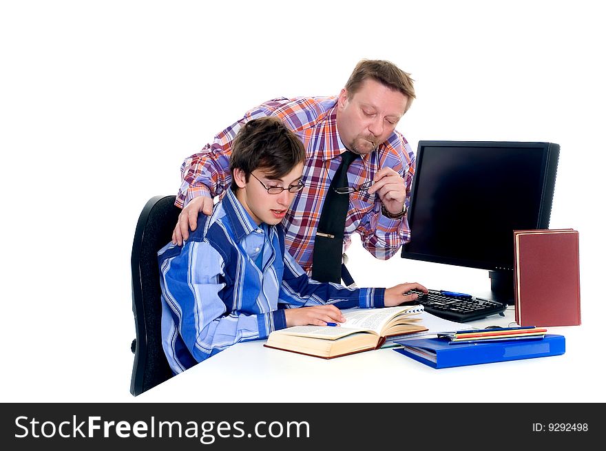 Teenager student doing homework with computer and books on desk, proud father looking over,white background