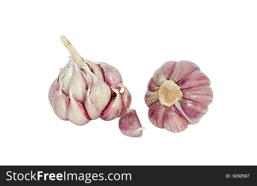 Garlic and cloves isolated on white background