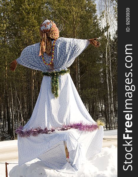 The dressed up snow figure in the form of dressed on snow whom of various clothes. It is a traditional Siberian ceremony of carrying out of winter. The dressed up snow figure in the form of dressed on snow whom of various clothes. It is a traditional Siberian ceremony of carrying out of winter