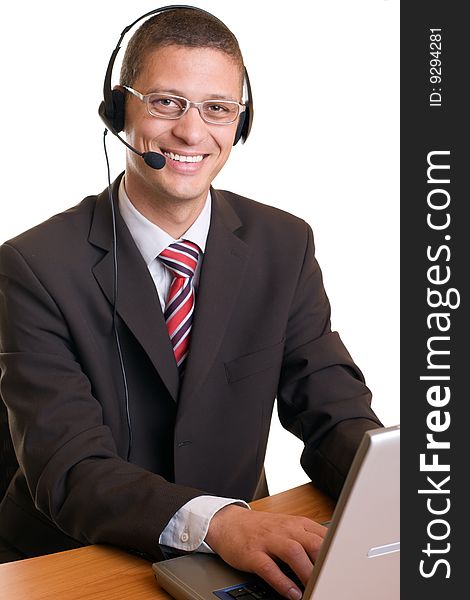 Young charming confident men with headset and notebook. Young charming confident men with headset and notebook