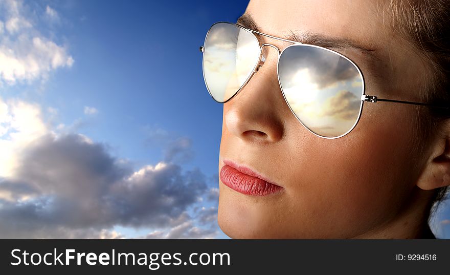 Closeup of woman wearing sunglasses