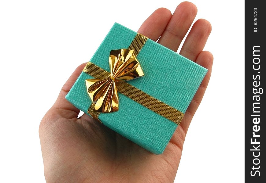 Gift in a hand.Gift packing on white.