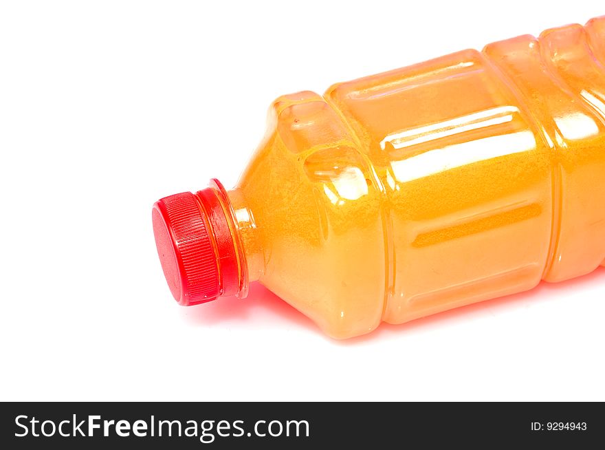 Orange juice bottle isolated on white.