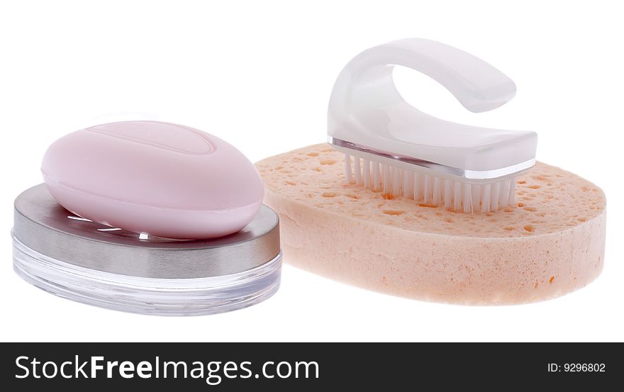 Soap and nailbrush, hygiene products isolated against white background