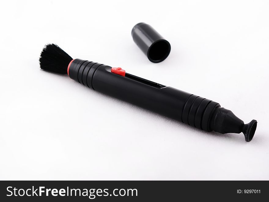 Lens pen on white background.