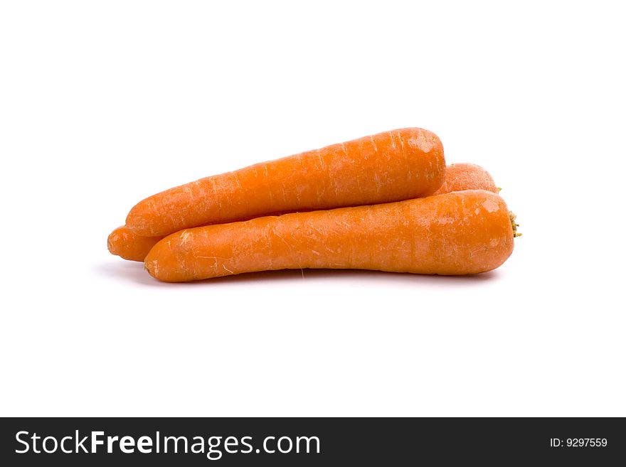 Fresh carrots isolated on white background