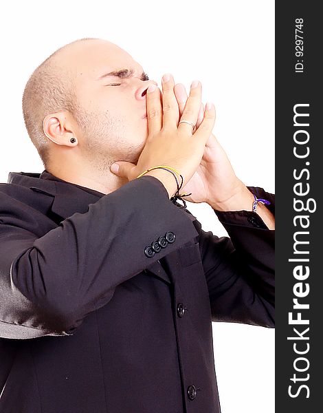 Young man with close eyes on white background